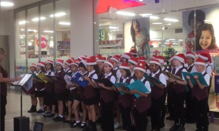 FCPS Choir Sings to Open Christmas Season at Kmart